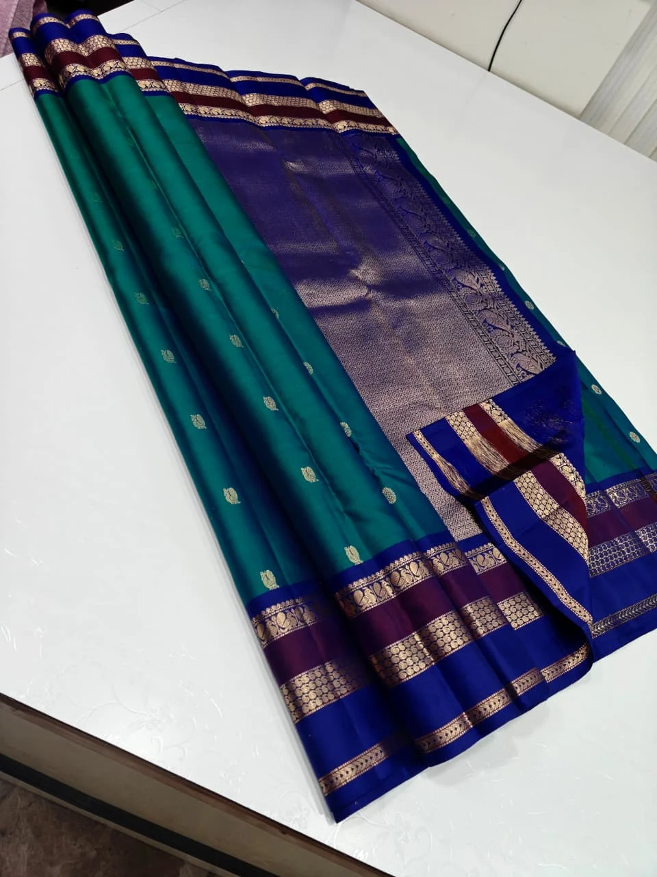 Pure kanchipuram silk sarees handwoven with  Green and Purple